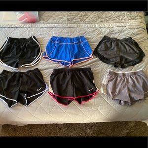 6 pairs of Nike/Reebok running shorts